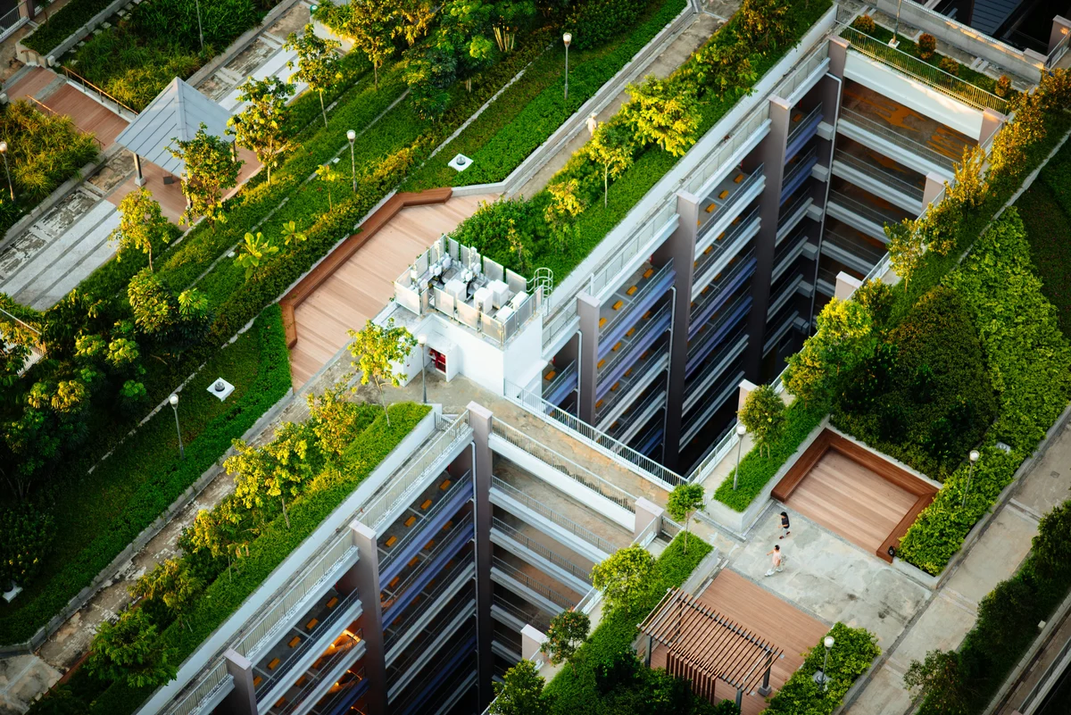 Aerial view of green rooftops in a dense urban development